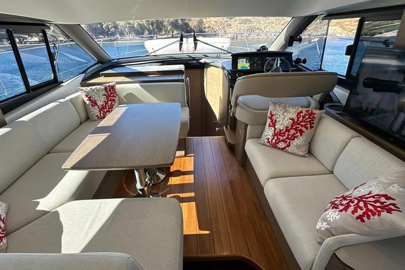  Yacht Photos Pics Luxurious interior of 2023 Princess F45 yacht with elegant seating and nautical decor.