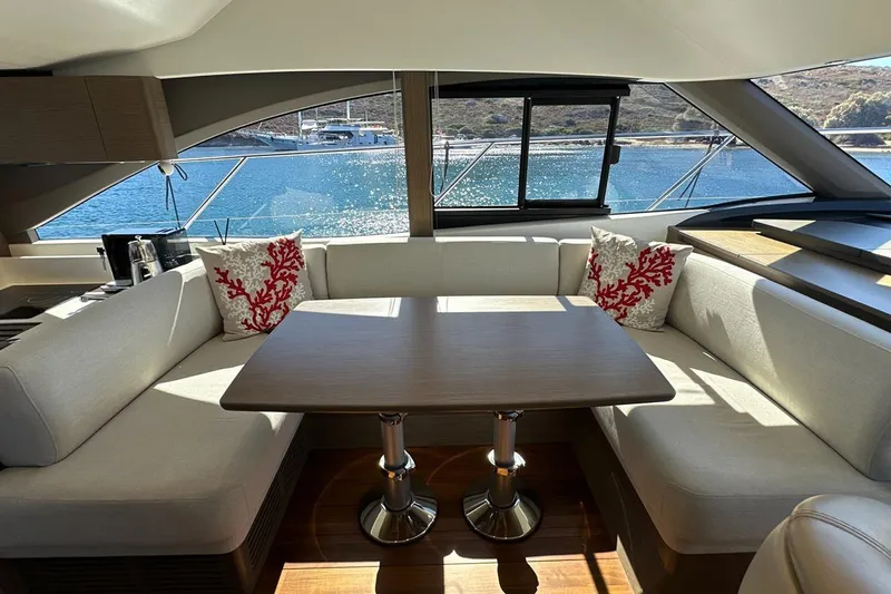  Yacht Photos Pics Luxurious 2023 Princess F45 yacht interior with elegant seating and scenic ocean view.