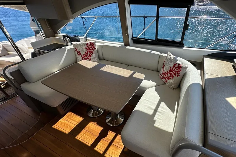  Yacht Photos Pics Luxurious 2023 Princess F45 yacht interior with elegant seating and ocean view.