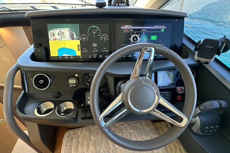  Yacht Photos Pics 2023 Princess F45 yacht helm with advanced navigation displays and controls.