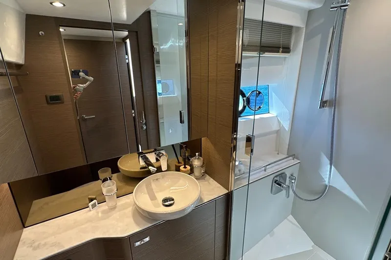  Yacht Photos Pics Luxurious bathroom interior of 2023 Princess F45 yacht, featuring modern fixtures and elegant design.