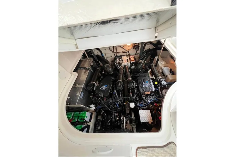  Yacht Photos Pics Engine compartment of a 2005 Sea Ray Sundancer 320 boat, showcasing dual engines.
