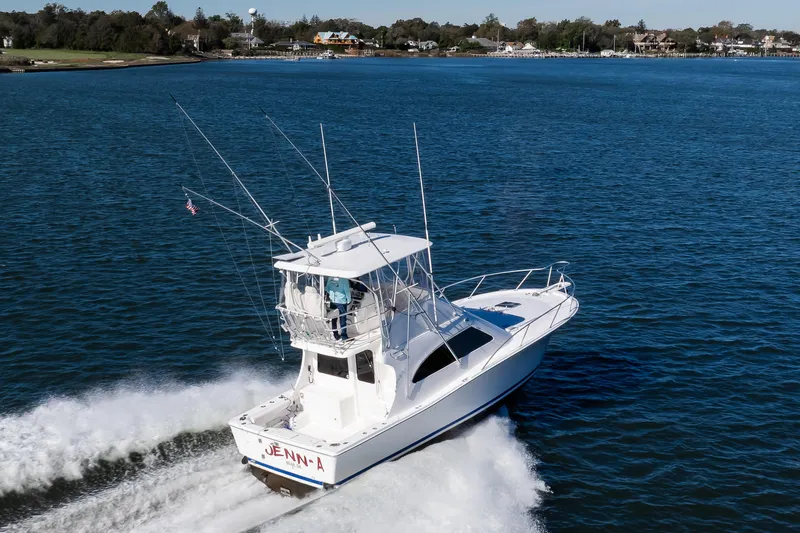 Jenn-a Yacht Photos Pics 2007 Luhrs Tournament 360 Open cruising on a scenic waterway.