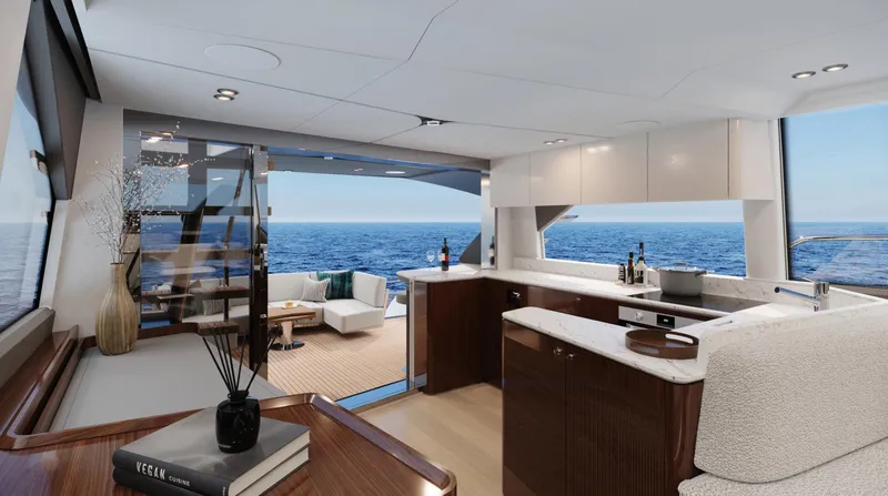  Yacht Photos Pics Luxurious interior of 2026 Fairline Squadron 58 yacht with ocean view and modern kitchen.