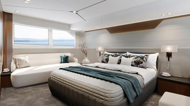  Yacht Photos Pics Luxurious bedroom interior of 2026 Fairline Squadron 58 yacht with modern decor and large windows.
