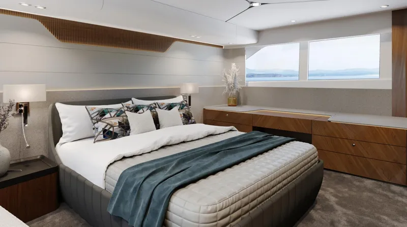  Yacht Photos Pics Luxurious bedroom interior of 2026 Fairline Squadron 58 yacht with modern decor and ocean view.