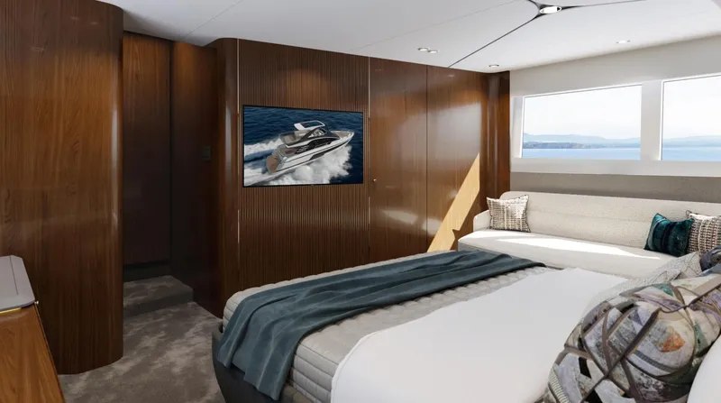  Yacht Photos Pics Luxurious bedroom interior of 2026 Fairline Squadron 58 yacht with modern decor and ocean view.