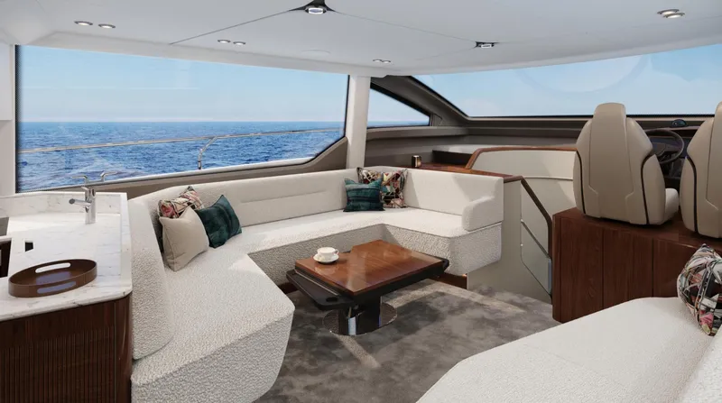 Yacht Photos Pics Luxurious interior of 2026 Fairline Squadron 58 yacht with elegant seating and ocean view.