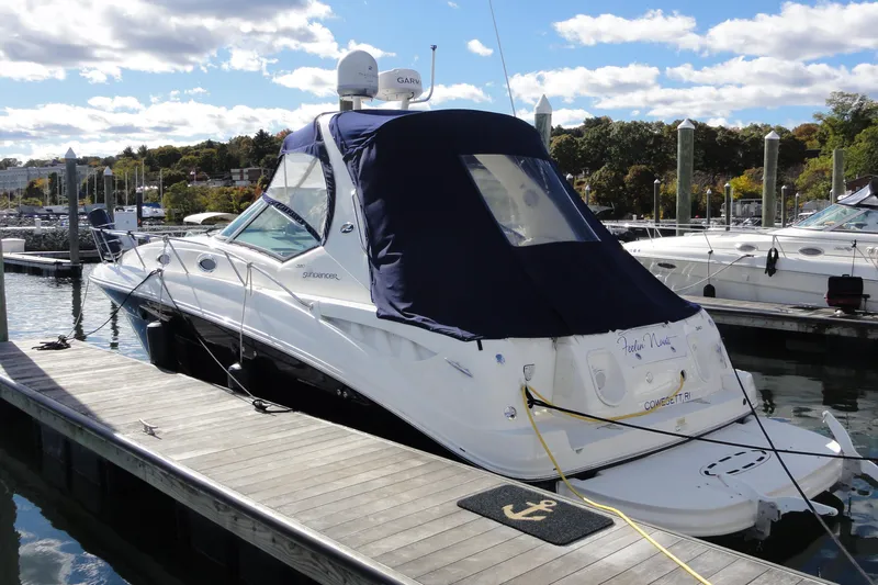  Yacht Photos Pics 2007 Sea Ray 320 Sundancer docked at marina under clear skies.