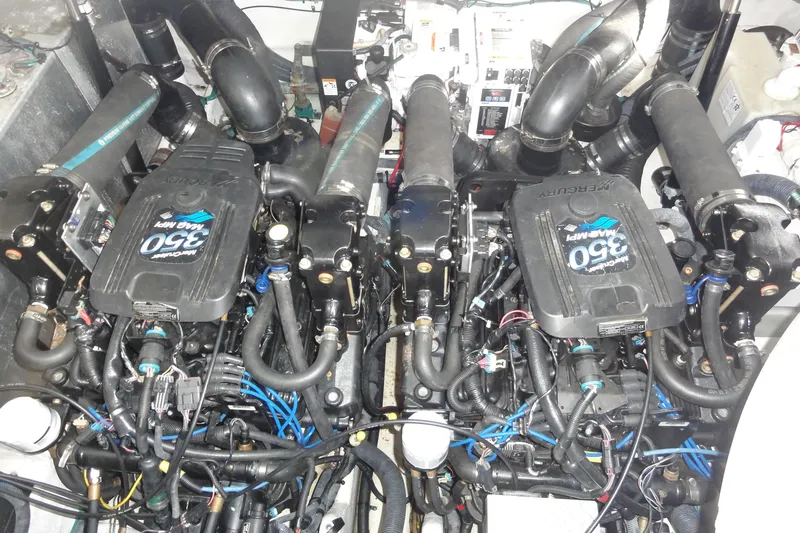  Yacht Photos Pics Engine compartment of a 2007 Sea Ray 320 Sundancer with twin MerCruiser 350 MAG MPI engines.