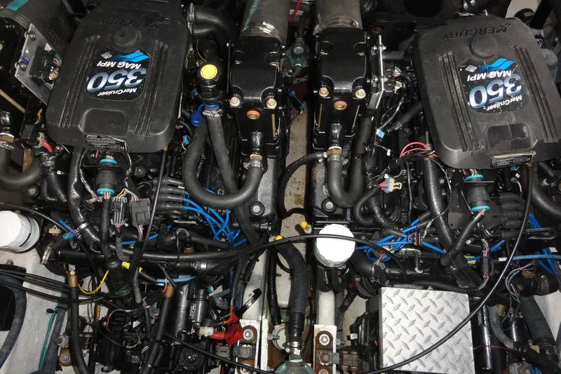  Yacht Photos Pics Engine compartment of a 2007 Sea Ray 320 Sundancer with twin MerCruiser 350 MAG MPI engines.