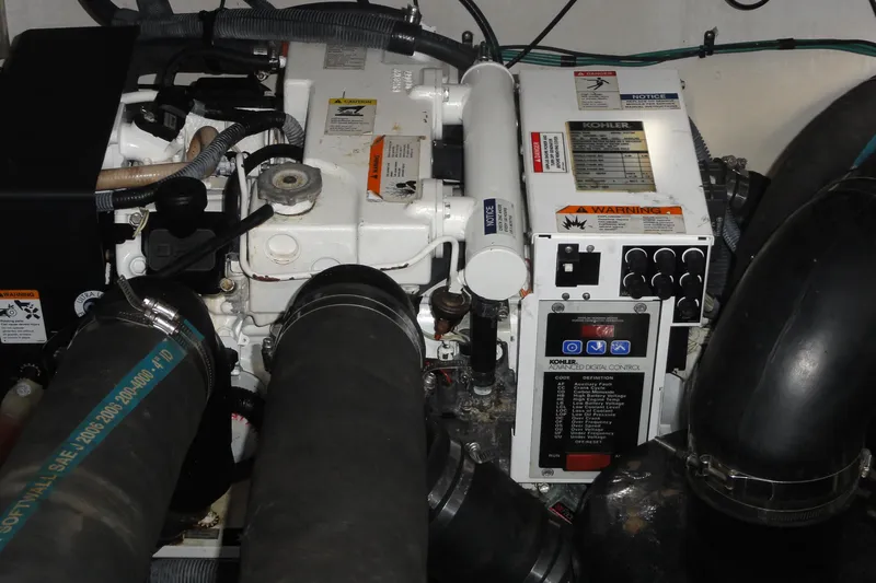  Yacht Photos Pics Engine compartment of a 2007 Sea Ray 320 Sundancer with Kohler generator.