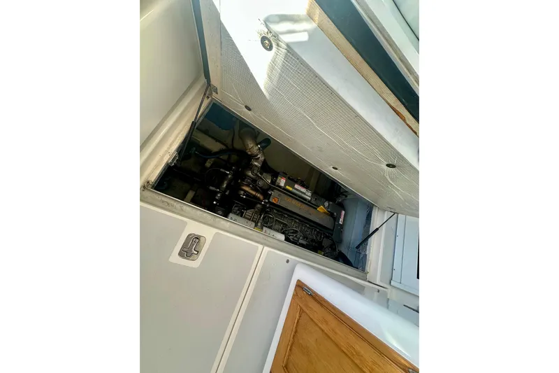 Seaquell Yacht Photos Pics Engine compartment of 2005 Legacy Yachts 34 Express, showcasing mechanical components.