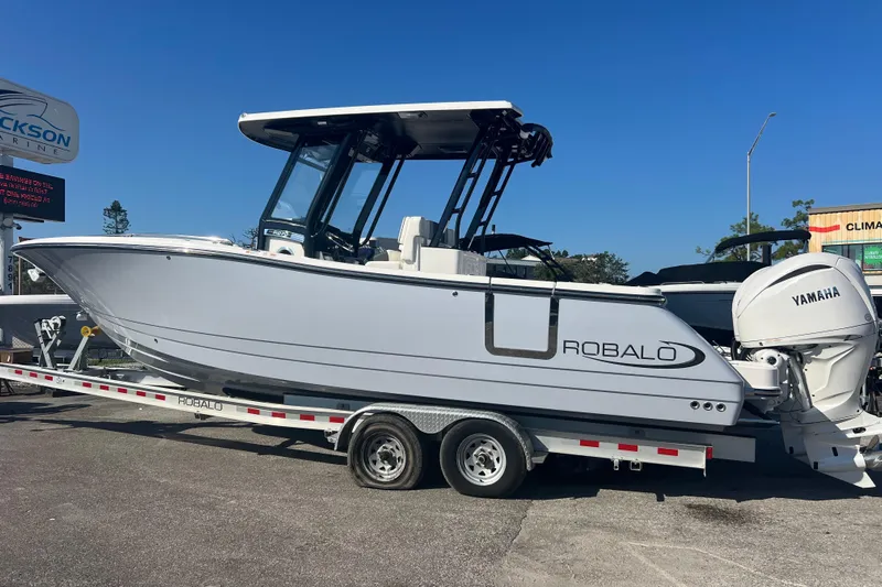  Yacht Photos Pics 2025 Robalo R270 Center Console boat on trailer, featuring Yamaha engine.