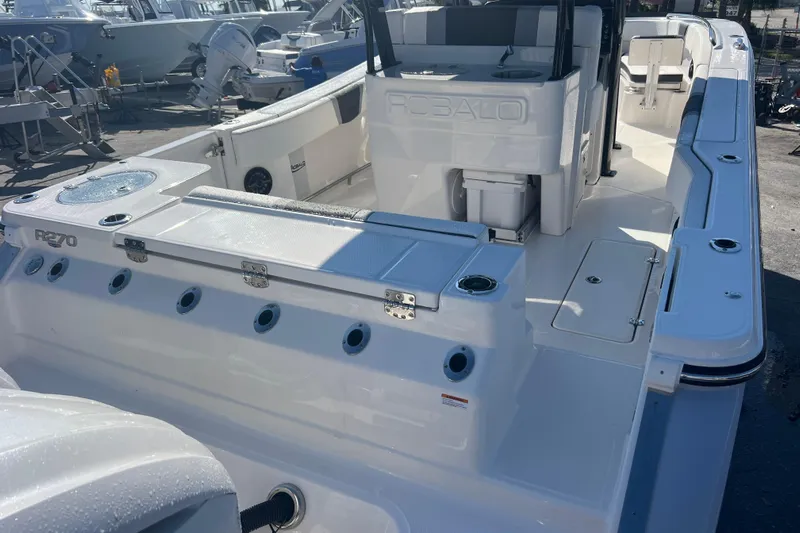  Yacht Photos Pics 2025 Robalo R270 Center Console boat, sleek design, spacious deck, modern features.