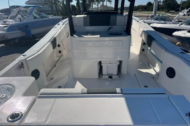  Yacht Photos Pics 2025 Robalo R270 Center Console boat interior with seating and storage features.