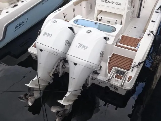  Yacht Photos Pics 2017 Sea Fox 288 Commander with twin 300 horsepower engines docked at marina.