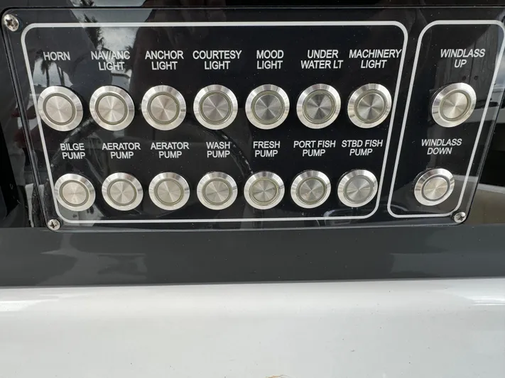  Yacht Photos Pics Control panel of a 2017 Sea Fox 288 Commander boat with labeled buttons.