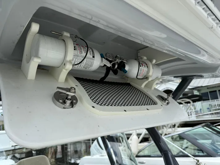  Yacht Photos Pics 2017 Sea Fox 288 Commander boat storage compartment with safety equipment.