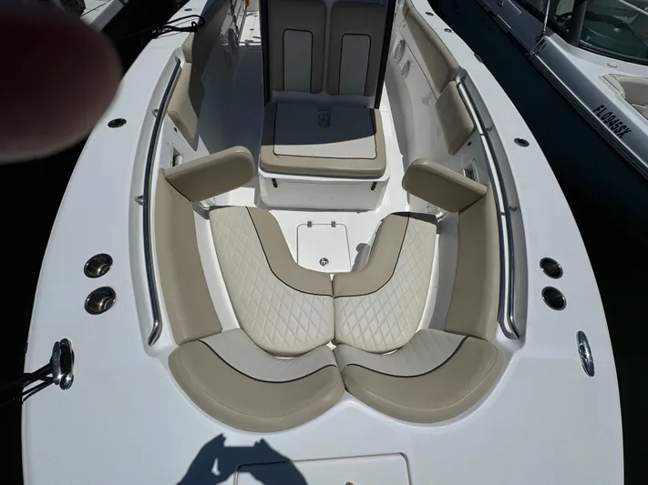  Yacht Photos Pics 2017 Sea Fox 288 Commander boat interior with cushioned seating and storage.