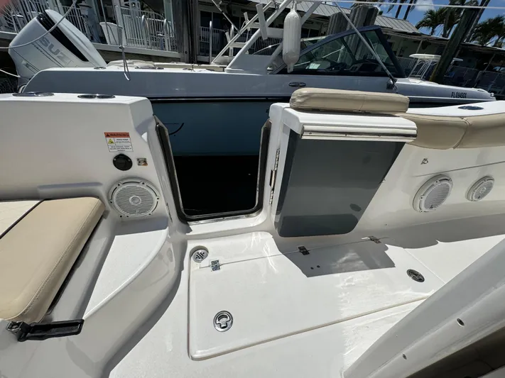  Yacht Photos Pics 2017 Sea Fox 288 Commander boat interior with seating and storage compartments.