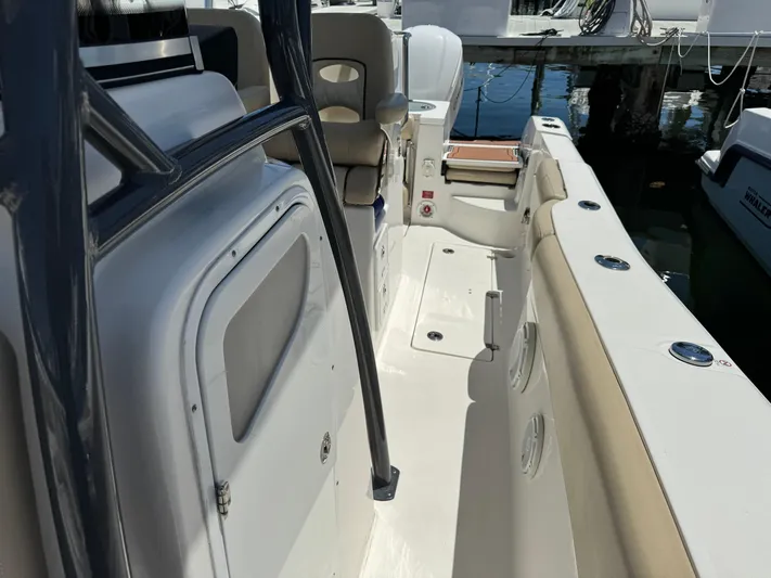  Yacht Photos Pics 2017 Sea Fox 288 Commander boat interior with seating and storage compartments.