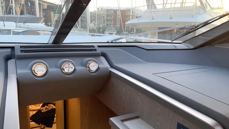 Yacht Photos Pics 2020 Ferretti Yachts 550 dashboard with gauges, docked in marina.