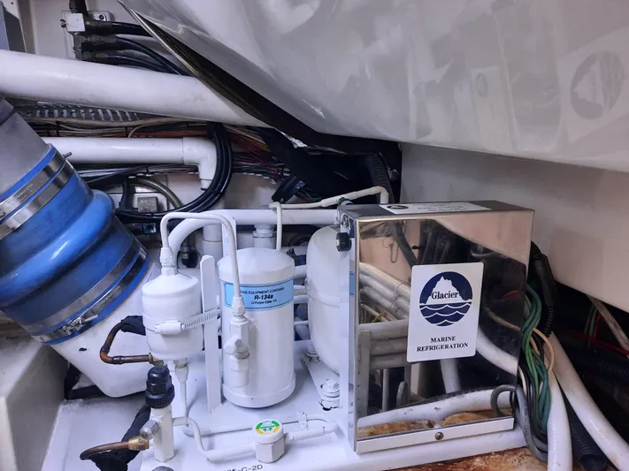 Foam O Yacht Photos Pics Engine room of Cabo 45 Express 2000 with cooling system.