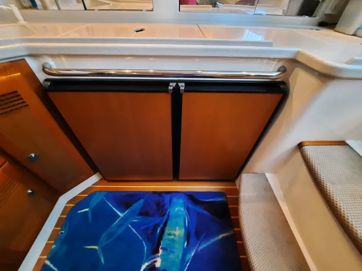 Foam O Yacht Photos Pics Interior of 2000 Cabo 45 Express yacht with marine-themed decor.