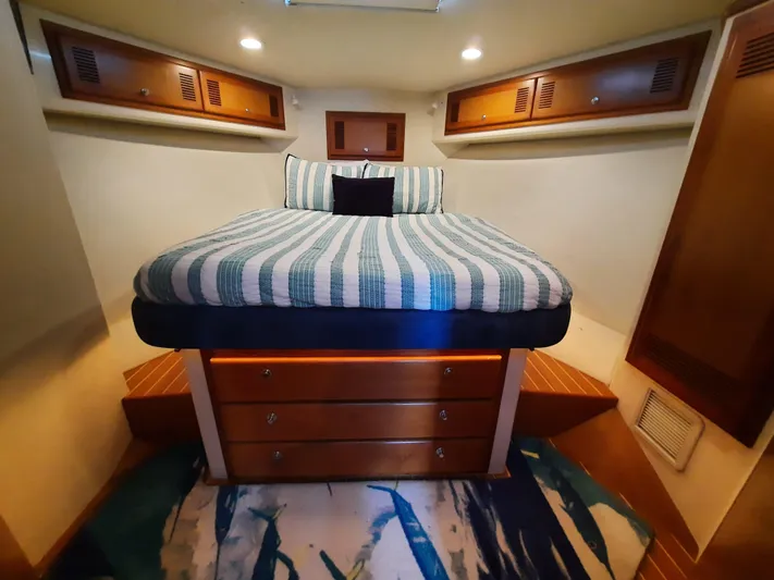 Foam O Yacht Photos Pics Interior of Cabo 45 Express 2000 with cozy bed.