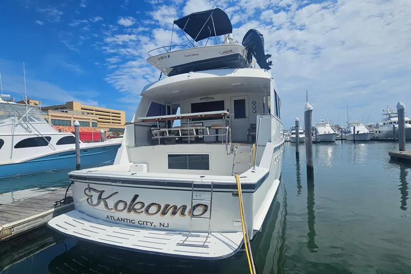 Kokomo Yacht Photos Pics 1990 Hatteras 67 Cockpit Motor Yacht docked in Atlantic City marina.