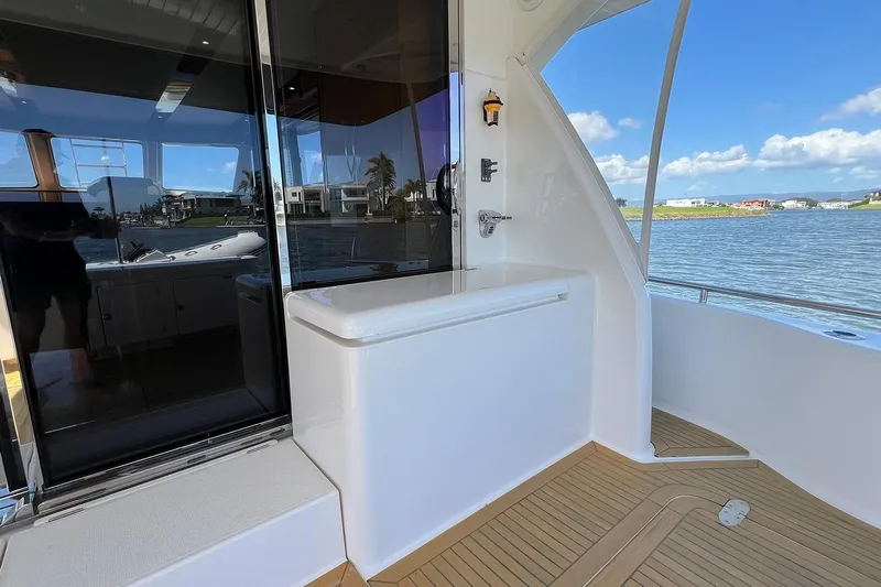Kahala Yacht Photos Pics 2005 Maritimo M60 yacht deck with ocean view and sleek interior.