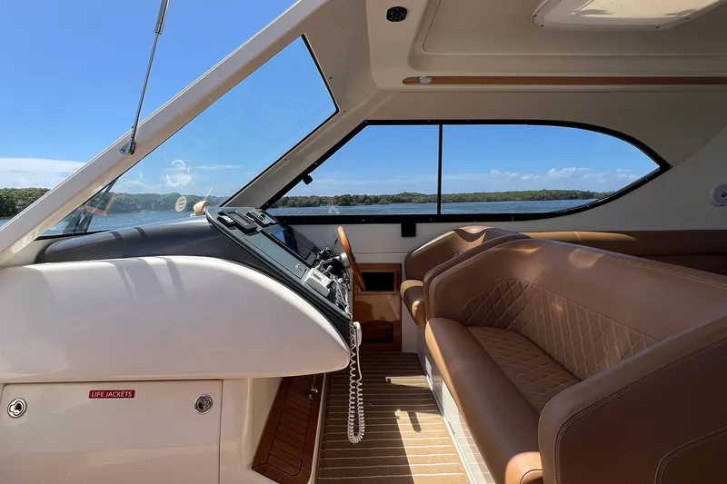 Kahala Yacht Photos Pics Interior of 2005 Maritimo M60 yacht with leather seating and scenic water view.