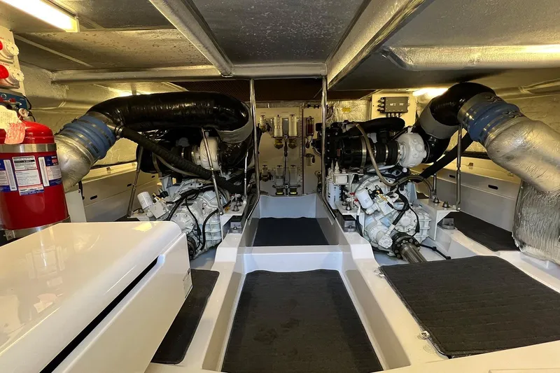 Kahala Yacht Photos Pics Engine room of a 2005 Maritimo M60 yacht, featuring dual engines and equipment.