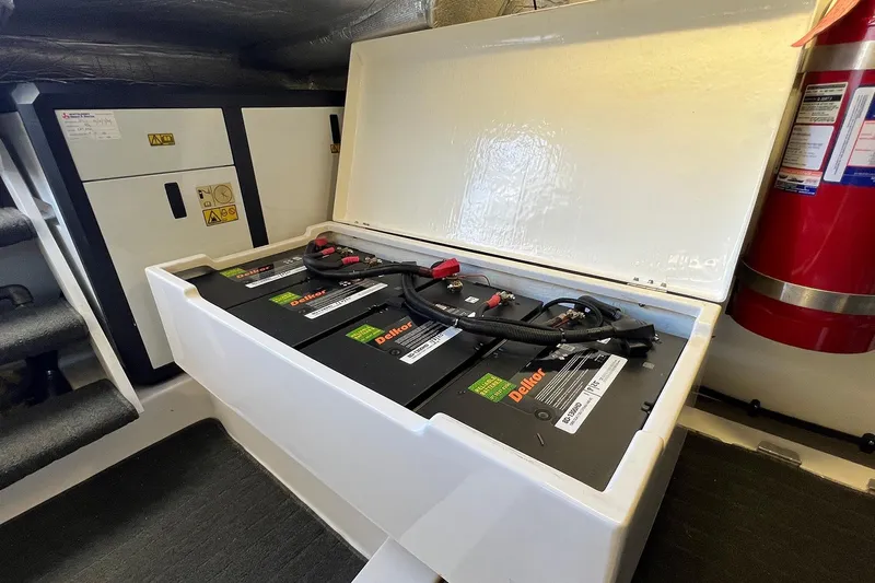 Kahala Yacht Photos Pics Battery compartment of a 2005 Maritimo M60 yacht, featuring Delkor batteries.