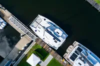 Aerial view of a 2016 Leopard 40 catamaran docked at a marina.