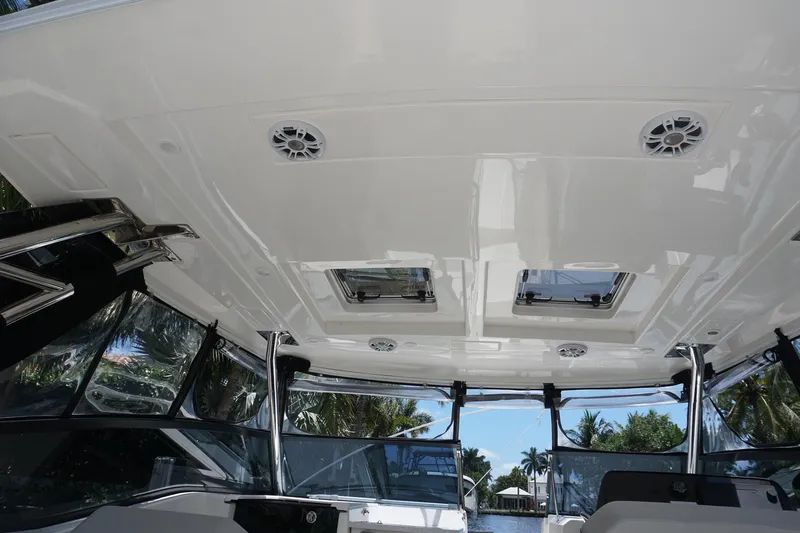 Sea)3 Yacht Photos Pics Aquila 32 Sport 2022 boat interior with sunroof and speakers.