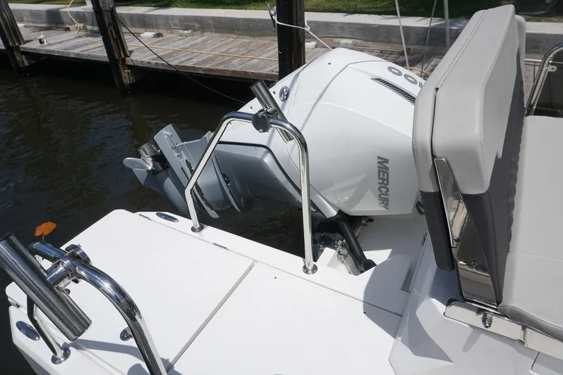Sea)3 Yacht Photos Pics Aquila 32 Sport 2022 boat with Mercury outboard engine at dock.
