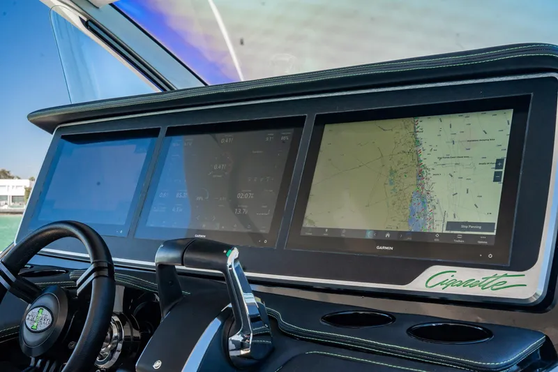  Yacht Photos Pics 2024 Cigarette 42' Auroris dashboard with advanced navigation screens and controls.