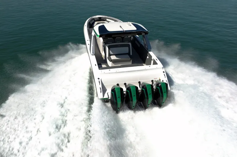  Yacht Photos Pics 2024 Cigarette 42' Auroris speedboat with four powerful engines cruising on open water.