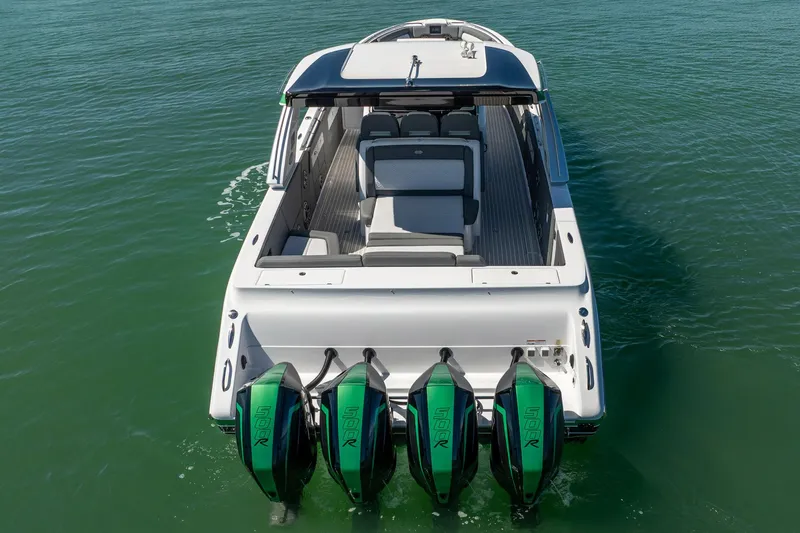  Yacht Photos Pics 2024 Cigarette 42' Auroris boat with four powerful outboard engines on water.