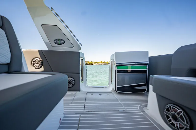  Yacht Photos Pics 2024 Cigarette 42' Auroris boat interior with sleek seating and water view.