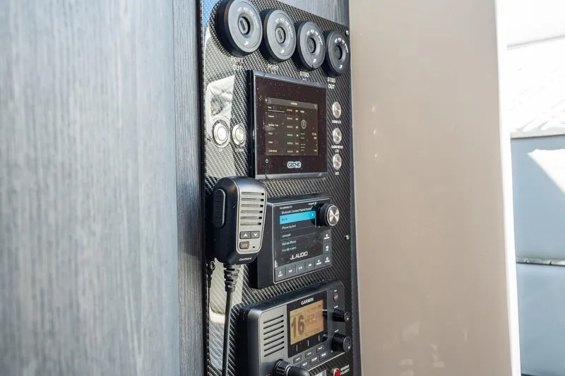  Yacht Photos Pics Control panel of 2024 Cigarette 42' Auroris boat with advanced audio and navigation systems.