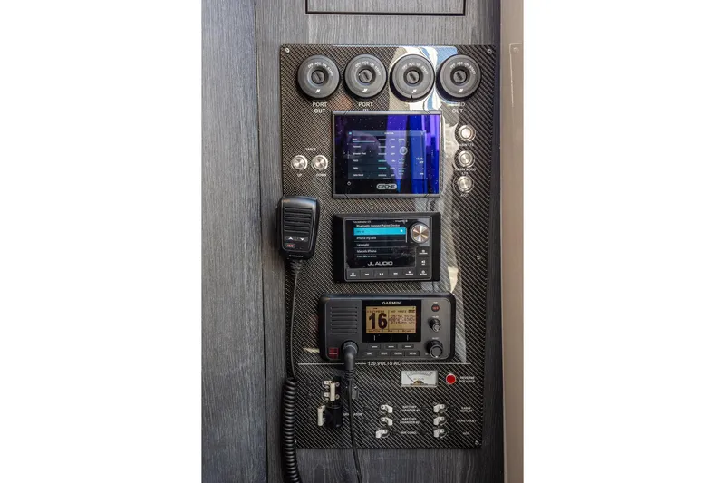  Yacht Photos Pics Control panel of 2024 Cigarette 42' Auroris boat with advanced audio and navigation systems.