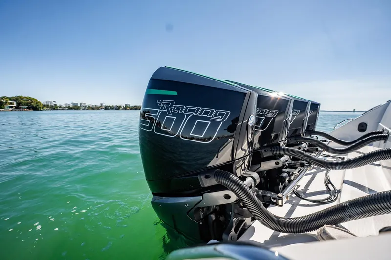  Yacht Photos Pics 2024 Cigarette 42' Auroris with powerful Racing 500 engines on clear water.