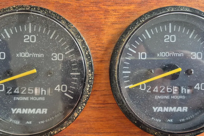 Burnin Daylight Yacht Photos Pics Yanmar engine hour meters on 1983 Grand Banks 42 Classic, showing 2425 and 2426 hours.