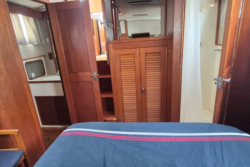 Burnin Daylight Yacht Photos Pics Interior of 1983 Grand Banks 42 Classic yacht with wooden cabinetry and cozy furnishings.
