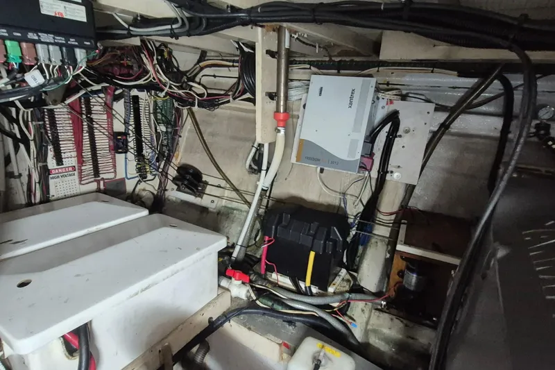 Burnin Daylight Yacht Photos Pics Engine room of 1983 Grand Banks 42 Classic with wiring and electrical components.