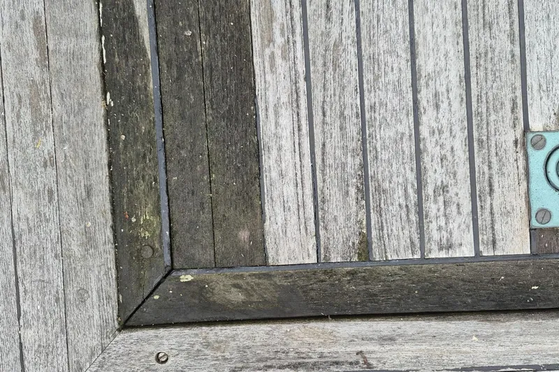 Burnin Daylight Yacht Photos Pics Weathered wooden deck of 1983 Grand Banks 42 Classic boat.