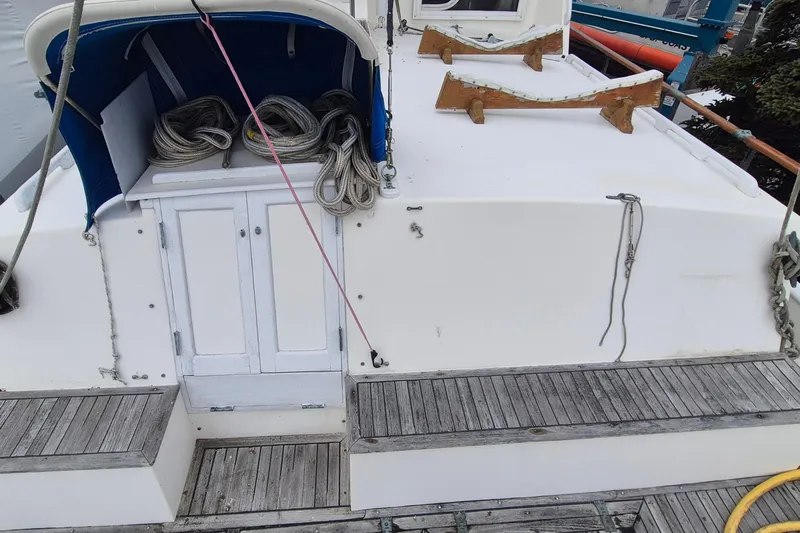 Burnin Daylight Yacht Photos Pics 1983 Grand Banks 42 Classic deck with ropes and wooden seating.